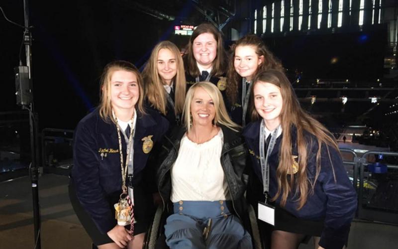 Sullivan FFA members shown with paraplegic rodeo champion and motivational speaker, Amberlee Snyder at National FFA Convention.