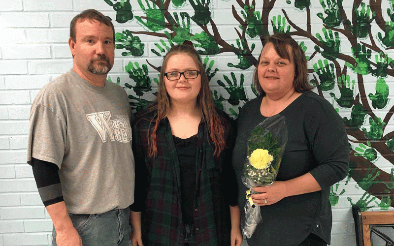 Strain-Japan eighth grade student, Mackenzie, and her parents.
