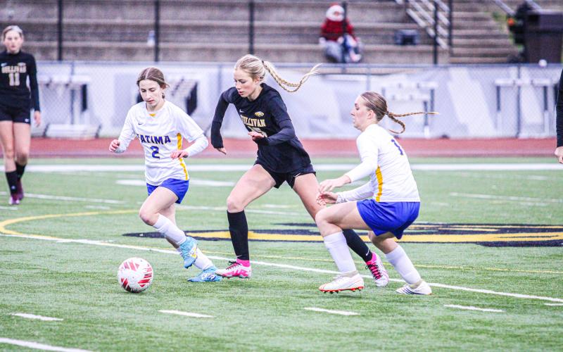 AVA HAYES (center). Photo by Wyatt Hardy Article Image Alt Text
