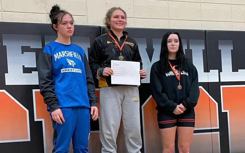 DORIE RICHARDSON (center) ran the table in Owensville. Photo via Sullivan High School Wrestling X Article Image Alt Text