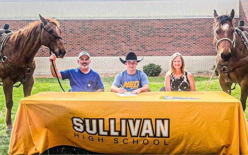 “LADIES LOVE COWBOYS.” Draysen Nolie (center) signed with Northeastern Oklahoma A&M College to continue his rodeo career. His proud parents and horses accompany him. Photo via Sullivan High School Facebook Article Image Alt Text