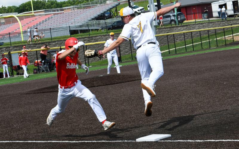 MITCHELL GARNER tags a runner out at first base. Photo by Extra Innings Photography Article Image Alt Text