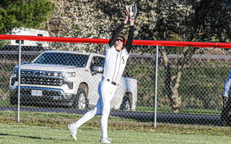 SETH VALLEY peaks up for a pop-out in Sullivan’s 10-7 win over Steelville on Wednesday, Mar. 27. Photo by Extra Innings Photography Article Image Alt Text