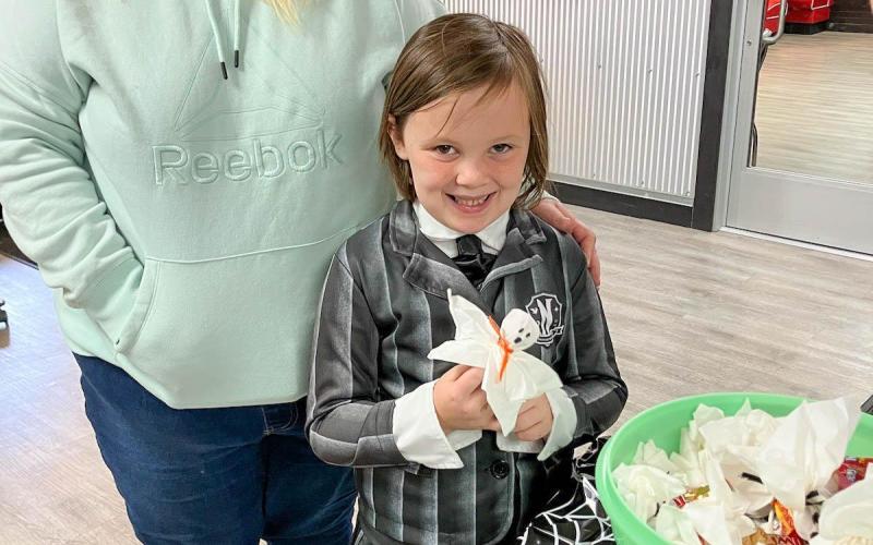 SOPHIA KOSARK and her mom at the treat table! Submitted photo Article Image Alt Text