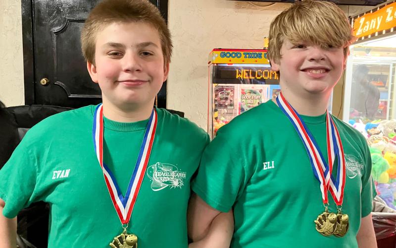 EVAN EMBRY (left) medaled alongside Eli Evans. Submitted photo Article Image Alt Text