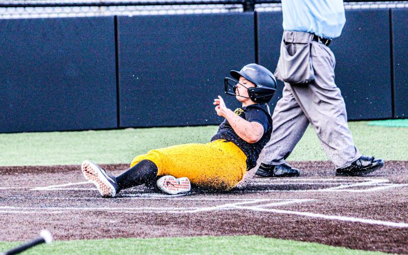 TURF SLIDE. Molly Lohden slid home for her third score against West Plains. She led Sullivan with three runs against the Zizzers. Photo by Wyatt Hardy Article Image Alt Text