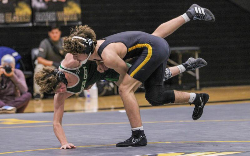 BRING THE BOOM. Brayden Kisner brought the boom to Ayedan Basler (Ste. Genevieve) in 1:30. Photo by Wyatt Hardy Article Image Alt Text