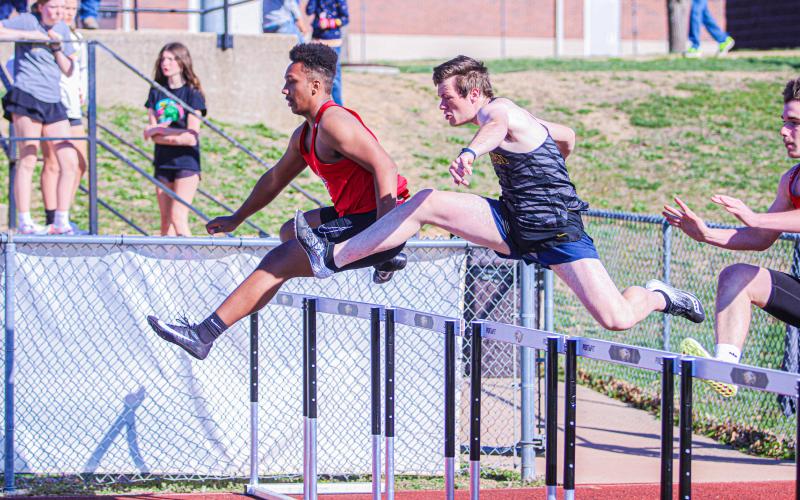 JAYSON SUMMERS (center) marked a time of 22.98 seconds in the 110-meter hurdles section, landing 5th. Photo by Wyatt Hardy Article Image Alt Text