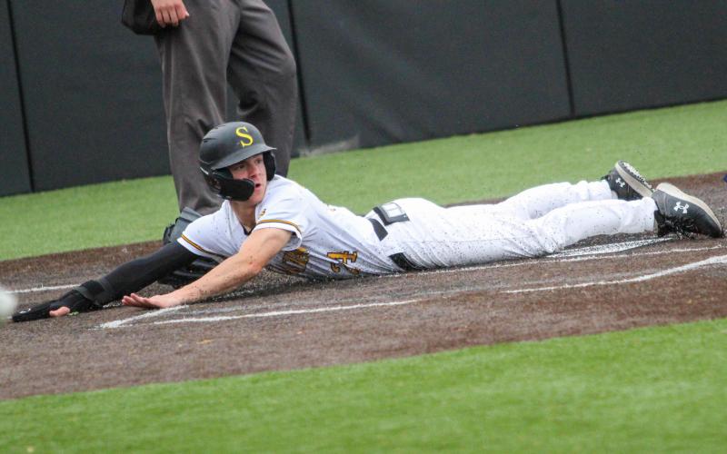 SURF ‘N SLIDE. Alex Toews batted 3-for-3 with 3 RBIs and 3 runs against Salem. Photo by Wyatt Hardy Article Image Alt Text
