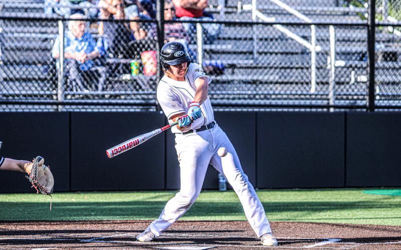 LUCAS PARSONS gets ready to launch the ball. Photo by Wyatt Hardy Article Image Alt Text