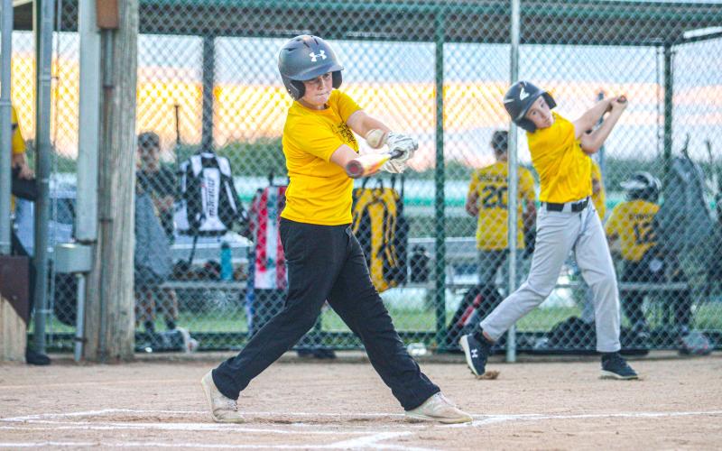ONE LAST SWING. FOE 12U gave it their all in their final battle at-bat in a 16-8 victory over 7 Cedars. Photo by Wyatt Hardy Article Image Alt Text