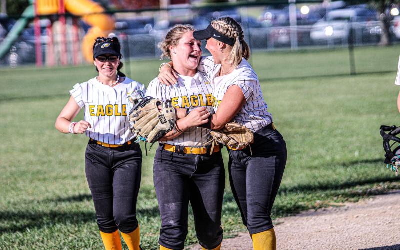 NO-FLY ZONE. Molly Lohden (right) hugged Dorie Richardson (left) after making a cartwheel-like out. Photo by Wyatt Hardy Article Image Alt Text