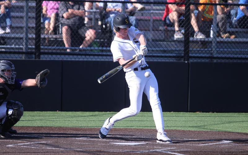 DRAKE GAWER unleashes his power onto the ball. Photo by Wyatt Hardy Article Image Alt Text
