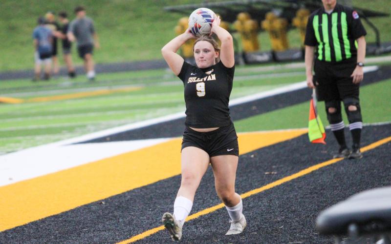 KARA SCHMIDT (9) dished out an assist to Ava Hayes in the St. James scrimmage. Photo by Wyatt Hardy Article Image Alt Text