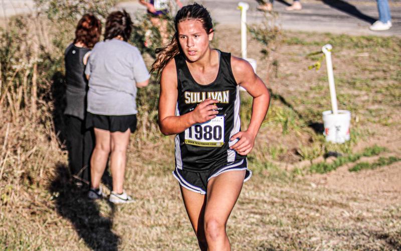FOUR RIVERS CHAMP. Corena Brauninger won the conference race for the middle school girls. Photo by Wyatt Hardy Article Image Alt Text