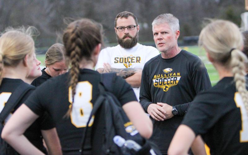 ‘STAY HUNGRY.’ Head Coach Matt Wiegers huddles with the Lady Eagles after they shut out Festus 3-0. Photo by Wyatt Hardy Article Image Alt Text