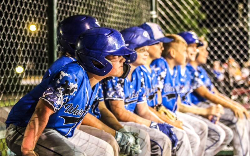 IN THE TRENCHES. The Bourbon Warhawks dugout was on the edge of their seats throughout the nail-biter. Photo by Wyatt Hardy Article Image Alt Text