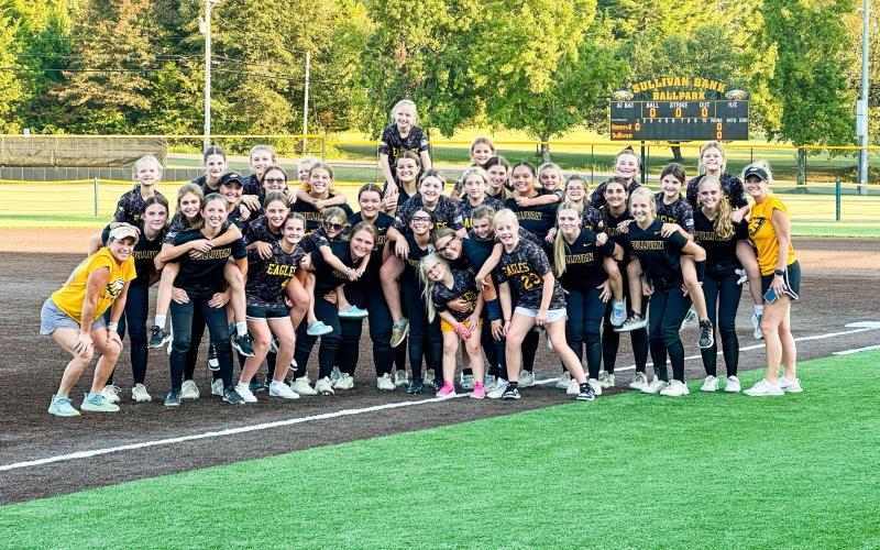 YOUTH NIGHT AT THE BALLPARK. The high school softball team held its youth night on Sept. 19. Photo by Extra Innings Photography Article Image Alt Text