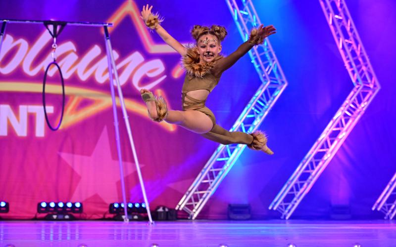 REACHING THE STARS. Baylee Flora seized her moment in the national spotlight, earning Double Platinums for “I Just Can’t Wait to Be King” and “Paint It Black.” The nine-year-old dancer has a bright future ahead of her at All That Jazz. Photo by Applause Talent Article Image Alt Text