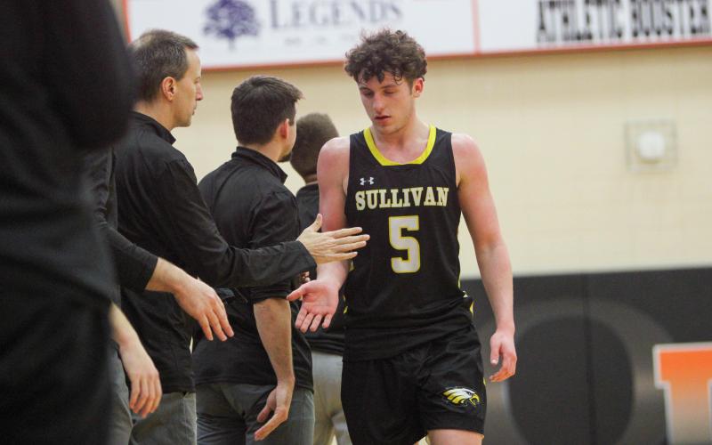 CHRIS GLASER walks off the court for one last time. Photo by Wyatt Hardy Article Image Alt Text