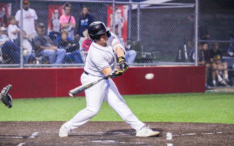 BIG MITCH. Mitchell Garner prepares to take a big hit at the ball. Photo by Wyatt Hardy Article Image Alt Text