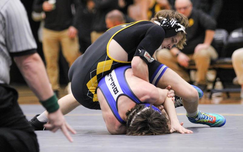 MAN IN THE ARENA. Eli Peregoy placed first at the Steve Johnson Invitational. Photo by Wyatt Hardy @ 12/11 Washington Dual Article Image Alt Text