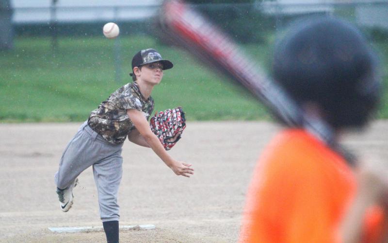 HEATER ON THE MOUND. Izaiah Landa (left) was the starting pitcher for Dace Construction. Photo by Wyatt Hardy Article Image Alt Text