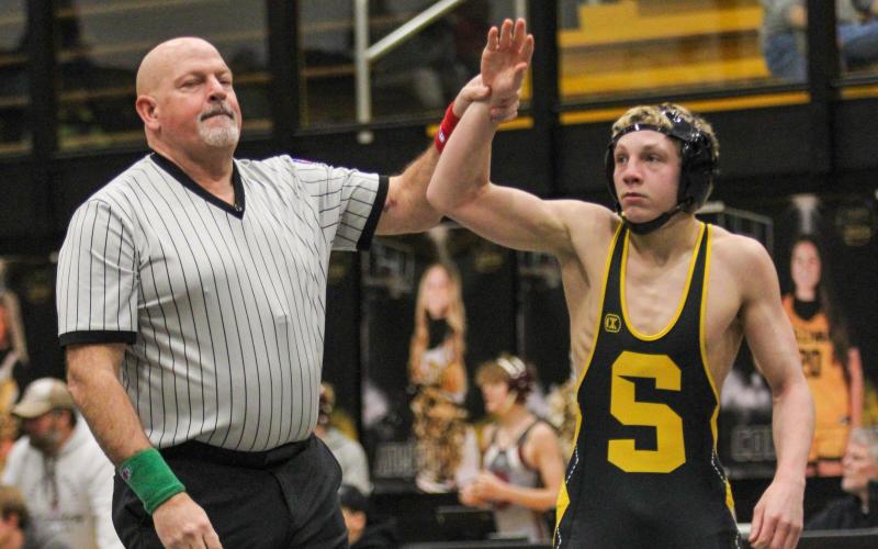 FOUR RIVERS CHAMPION. Camden Henderson swept his class at the conference tournament on Jan. 14. Photo by Wyatt Hardy @ Takedown Hunger Scramble Article Image Alt Text