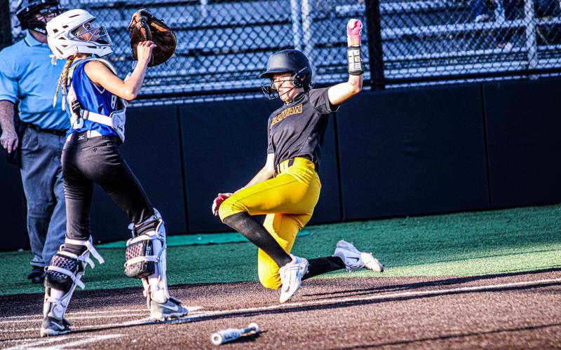 McKYNLEE PETERSON slides her way home. Photo by Wyatt Hardy Article Image Alt Text