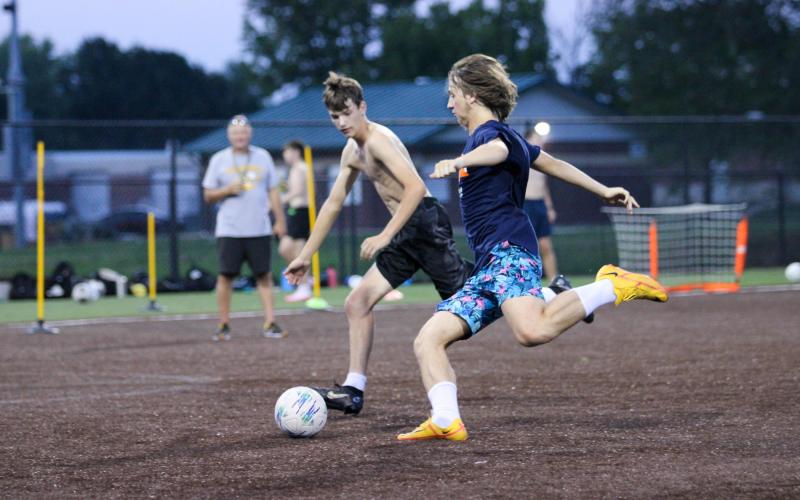 ETHAN EMBRY (right) tussles with Carsen Dudley (left). Photo by Wyatt Hardy Article Image Alt Text