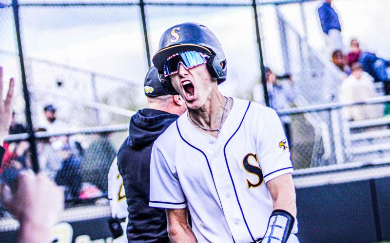 MVP. Gavin Schmidt earned the Most Valuable Player belt from head coach Ian Whitson after making four RBIs, four hits and a run against the St. James Tigers. Photo by Wyatt Hardy Article Image Alt Text