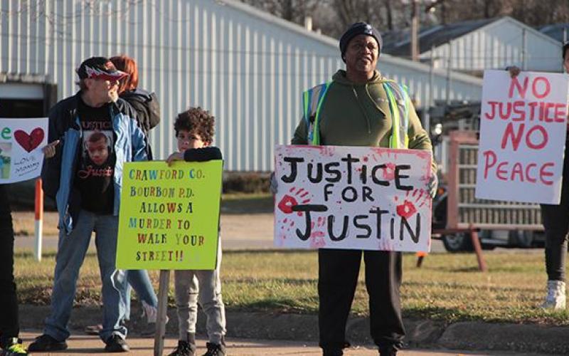 John King (right) is the father of Justin King, who was shot to death Nov. 3 at the Lakewood Mobile Home Park. John King was in Bourbon on Thursday to protest over the lack of charges filed against the shooter. Article Image Alt Text