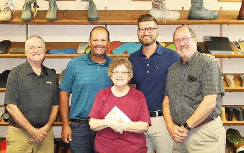 HONORED FOR 55 YEARS OF SERVICE. Mary Bobbitt, front center, was honored for 55 years of service at Meramec Group on September 8. Bobbitt started her career with the company in 1966 not long after it began in 1962. Pictured back row, left to right: John Suttenfield HR Director, Jason Blankenship, Director of Manufacturing, Jeff Dieckhaus, President and Doug Riley CFO. Photo by Carmin Ball Article Image Alt Text