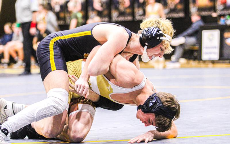 CARTER BLANKENSHIP grapples with Brayden Belding (Windsor) at a Sullivan home meet on Wednesday, Jan. 17. Photo by Wyatt Hardy. Article Image Alt Text