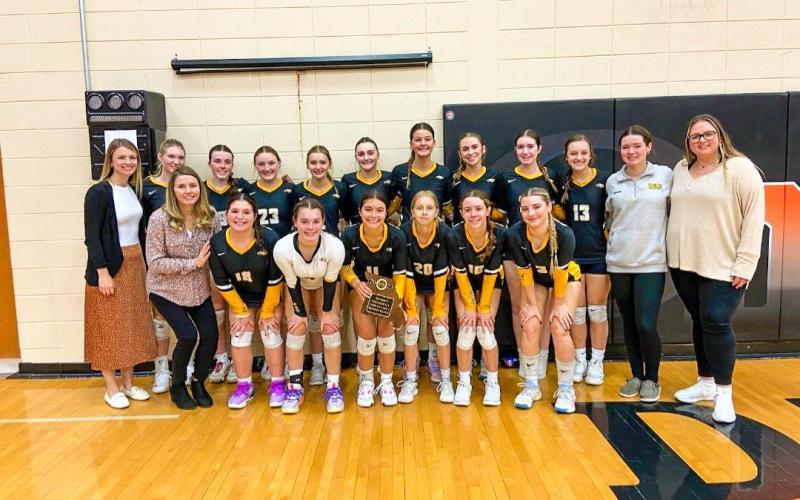 VOLLEYBALL PLACES SECOND. The Lady Eagles volleyball team are pictured here with their Class 3 District 9 second-place plaque, which they received after the district championship matchup on Tuesday, Oct. 24. Photo via Sullivan Eagles Volleyball X Article Image Alt Text