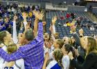 ONTO THE BIG DANCE. The Leathernecks are pictured celebrating after defeating Lindenwood to punch their ticket to the NCAA Division I Tournament. Photo via Western Illinois Women’s Basketball Facebook Article Image Alt Text