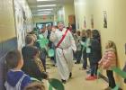 ST. ANTHONY HALLS are filled with joyous shouts of "Hosanna!" as they recreate Palm Sunday.