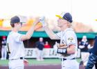 EAGLES SOAR AHEAD. Gavin Schmidt (left) fist bumps Cambrian Koch (right) during the St. James match. Photo by Wyatt Hardy Article Image Alt Text