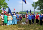 The Noah Coleman Chapter of the National Society of Daughters of the American Revolution (NSDAR) organized the event and placed the grave marker.